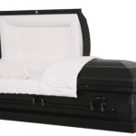 black coffin with black casket corners and white lining